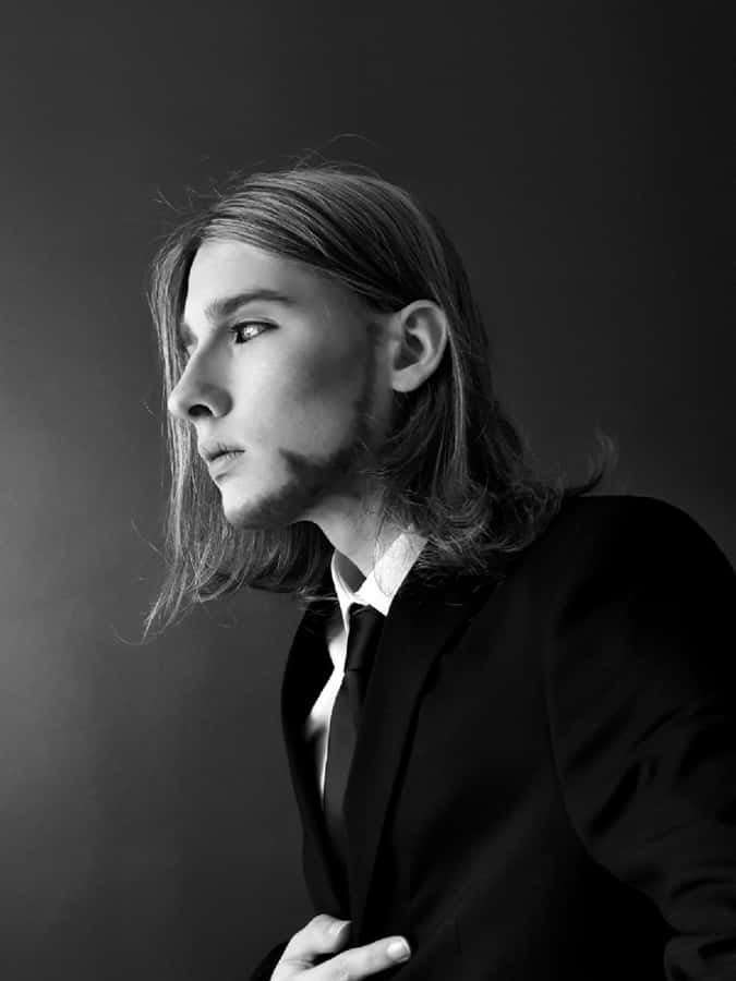 Monochrome Profileof Manin Suit Wallpaper