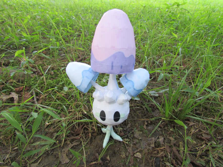 Morelull Figure On Green Grass Wallpaper