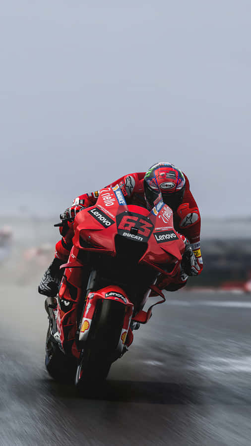 Moto G P Racer Speedingin Rain Wallpaper