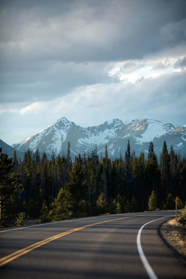 Mountain Road Leadingto Peaks Wallpaper