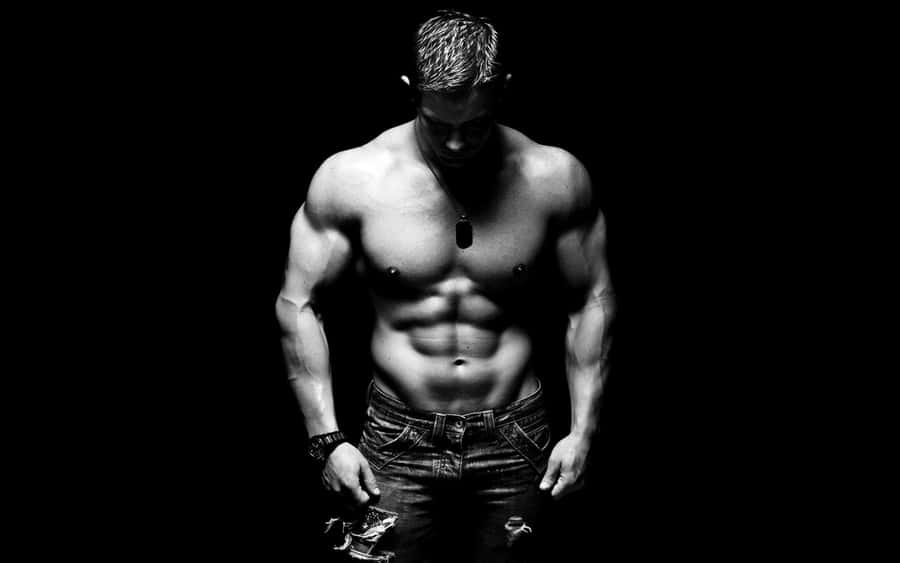 Muscular Manin Blackand White Wallpaper
