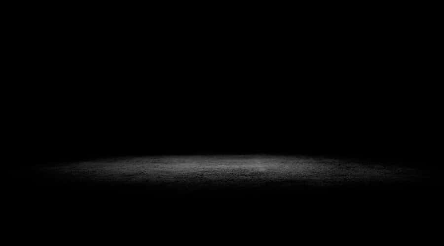 Mysterious Dark Corner With Shadowy Walls Wallpaper