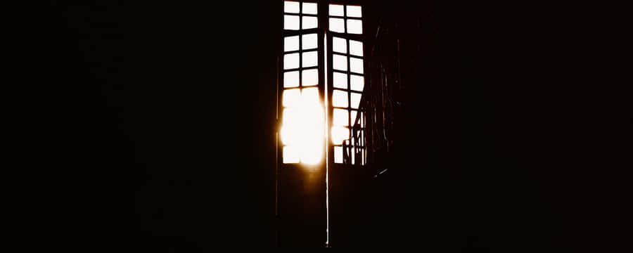 Mysterious Dark Room With Faint Light Wallpaper