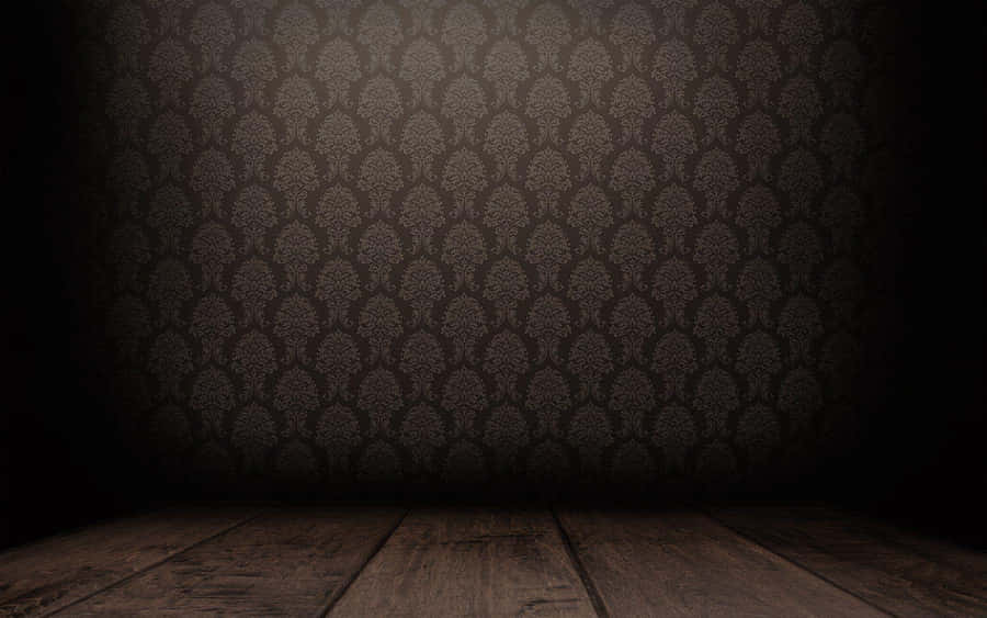 Mysterious Dark Room With Illuminated Doorway Wallpaper