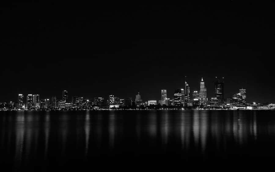 Mysterious Dark Tower Looming In Fantasy Landscape Wallpaper