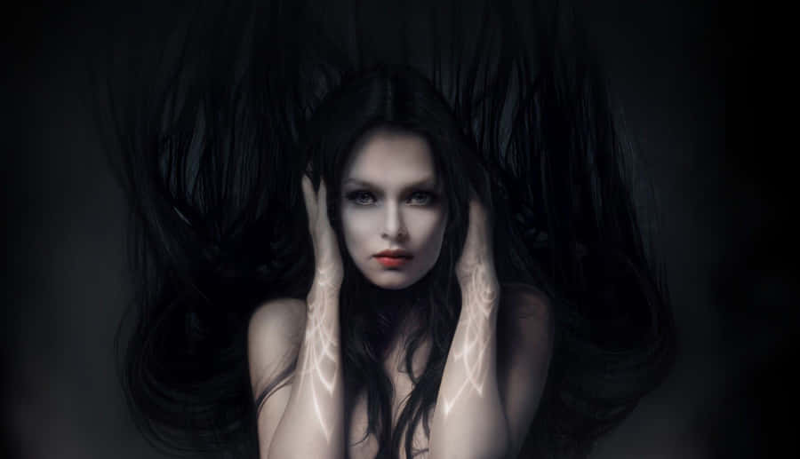 Mysterious Dark Witch In A Haunted Forest Wallpaper