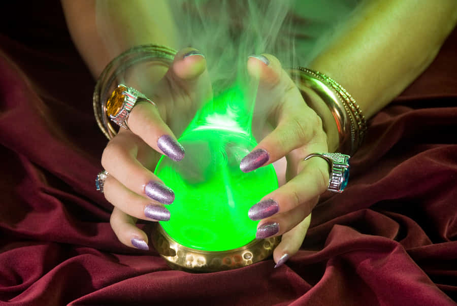 Mysterious Fortune Teller With Crystal Ball Wallpaper