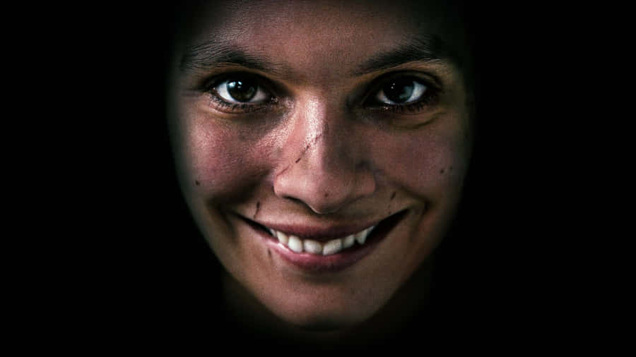 Mysterious_ Smile_in_ Darkness.jpg Wallpaper