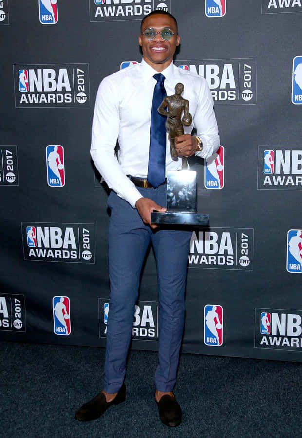 N B A Awards Winner Posing With Trophy2017 Wallpaper