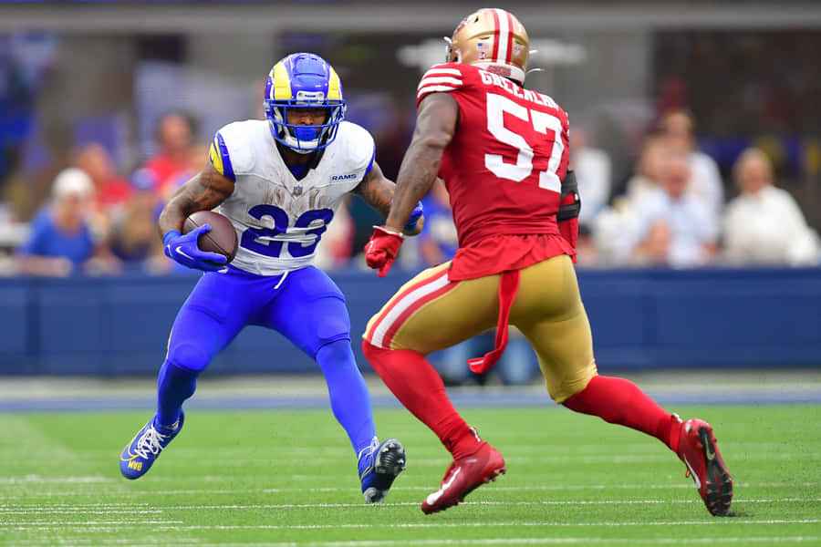 N F L Action Ramsvs49ers Wallpaper