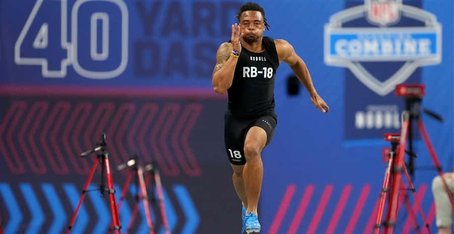 N F L Combine40 Yard Dash Performance Wallpaper