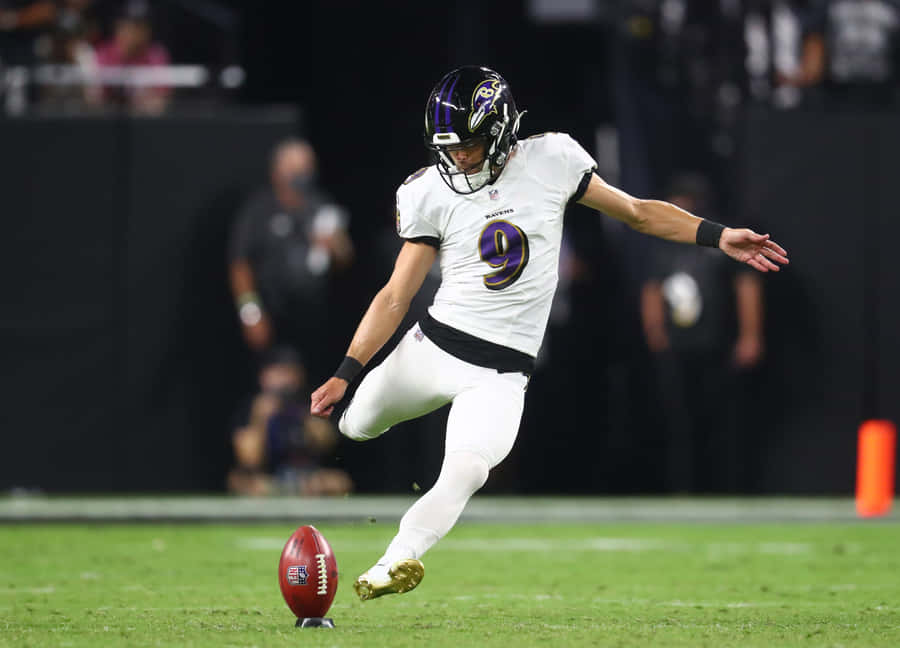 N F L Kicker Mid Field Goal Attempt Wallpaper