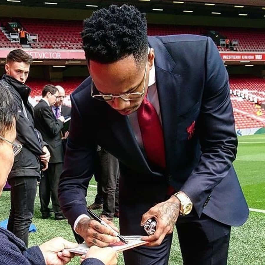Nathaniel Clyne Signing An Autograph Wallpaper