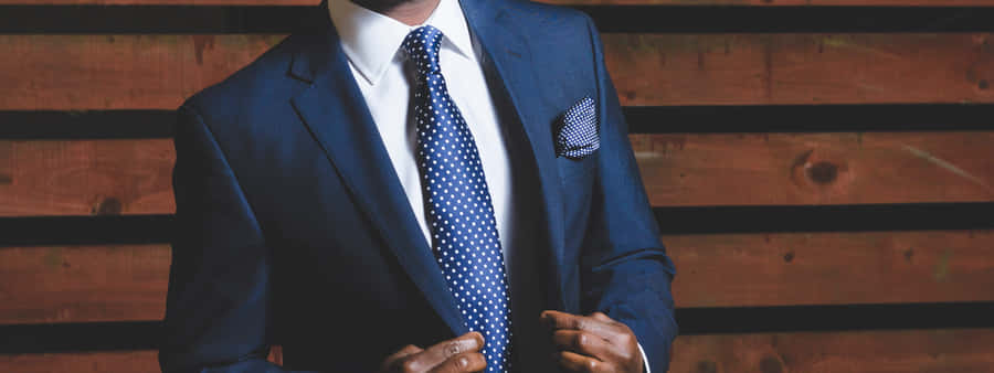 Navy Blue Tie - A Classic Fashion Piece Wallpaper