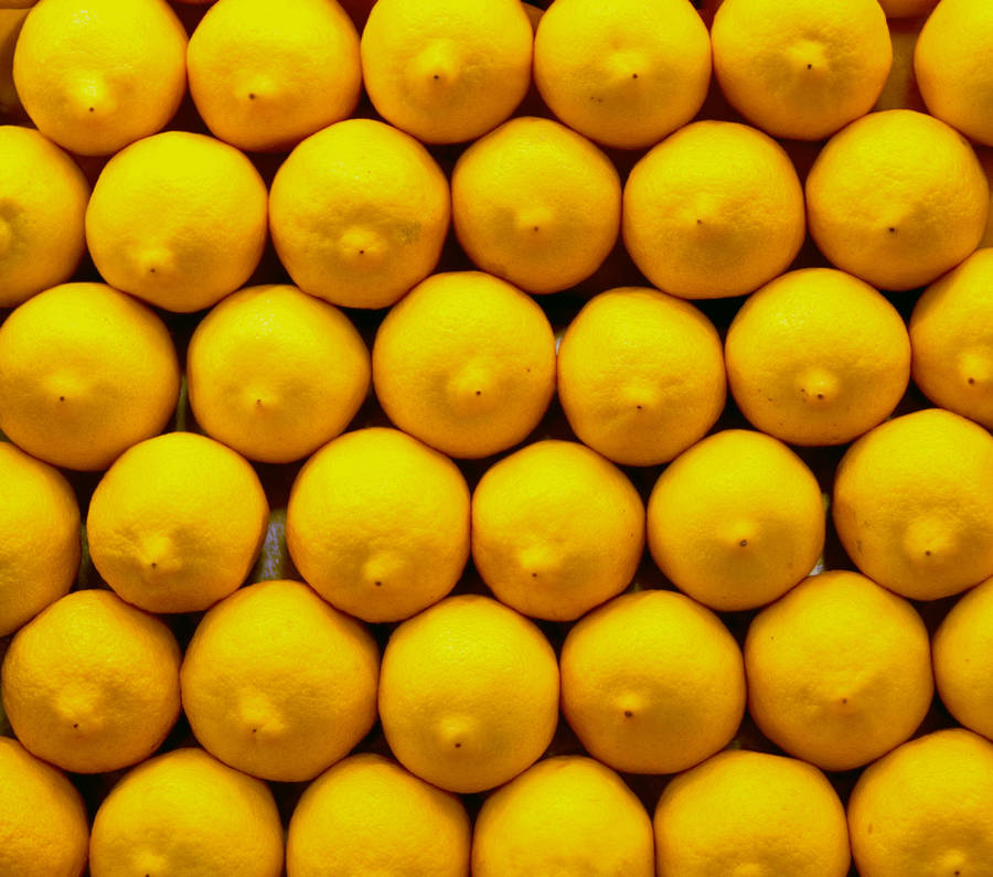 Neatly Stacked Lemon Fruit Wallpaper
