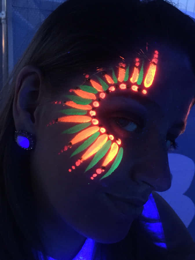 Neon_ Face_ Paint_ Under_ Black_ Light Wallpaper