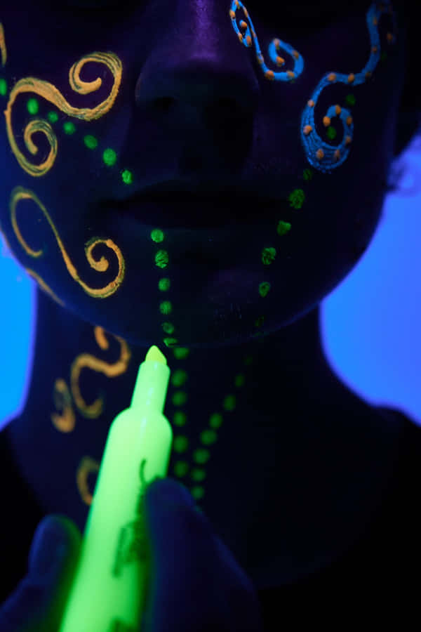 Neon_ Makeup_ Under_ Black_ Light Wallpaper