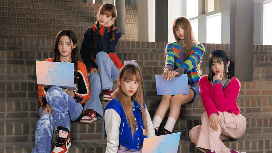 New Jeans_ Group_ Laptop_ Pose Wallpaper