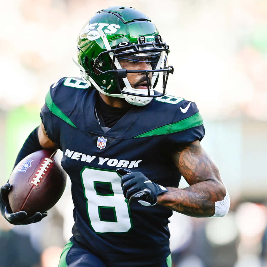 New York Jets Player Running With Football Wallpaper