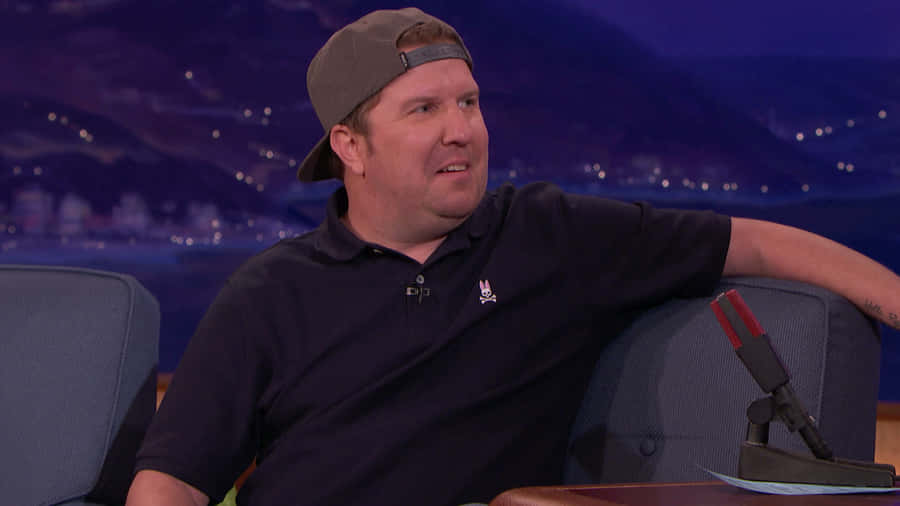 Nick Swardson, Grinning In Front Of The Camera. Wallpaper