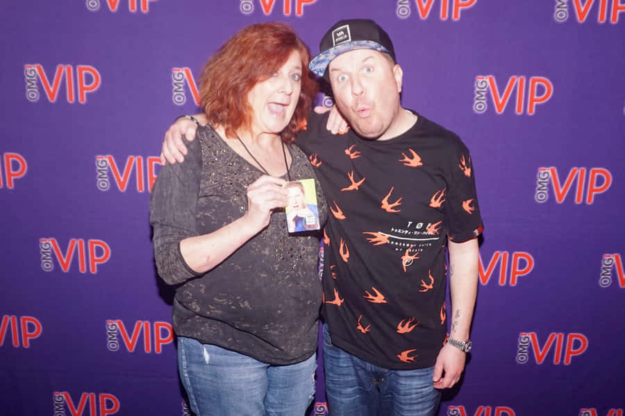 Nick Swardson Strikes An Iconic Pose In His Profession As A Comedian. Wallpaper