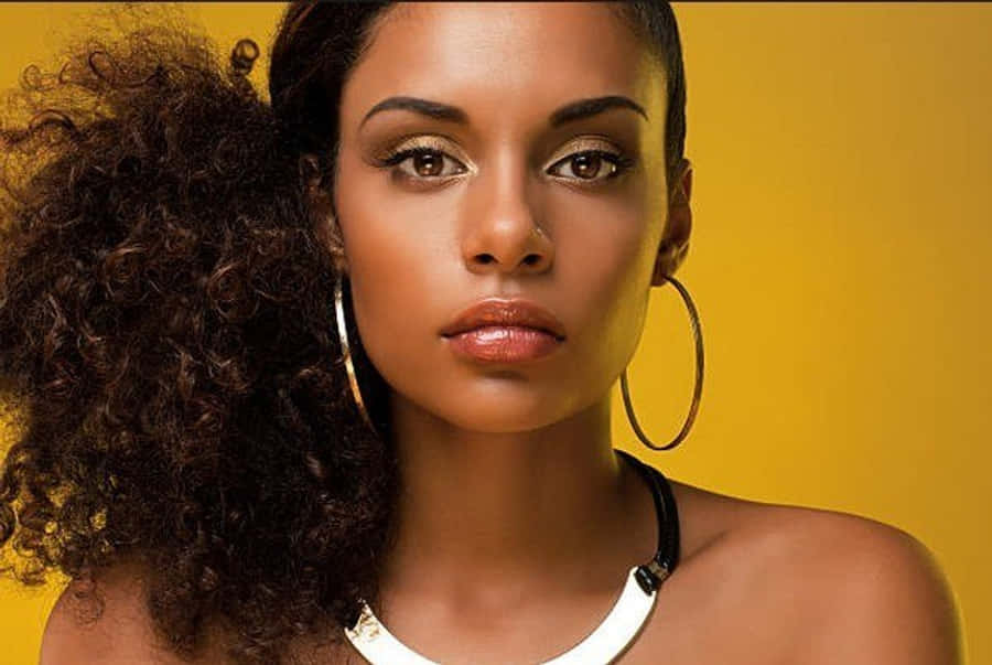 Nigerian Woman Yellow Background Wallpaper