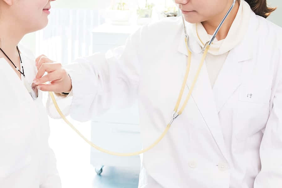 Nursing On Duty With Medical Equipment Wallpaper