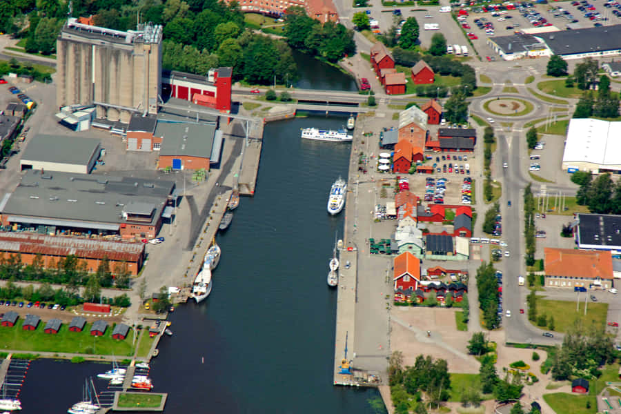 Nykoping Aerial Viewof Riverand Marina Wallpaper