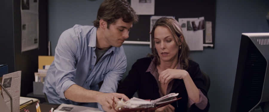 Office Scene Melora Hardinand Co Star Wallpaper