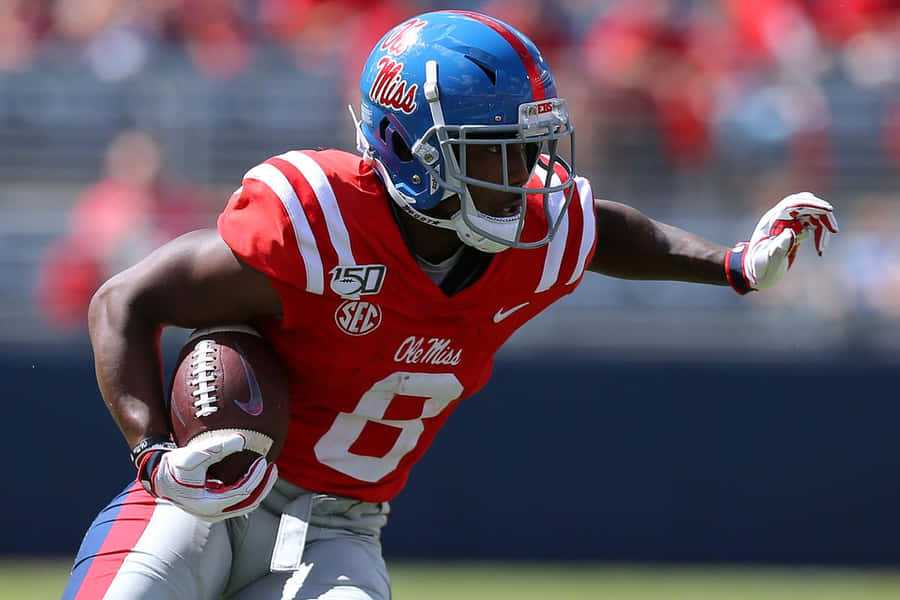 Ole Miss Football Player Action Shot Wallpaper