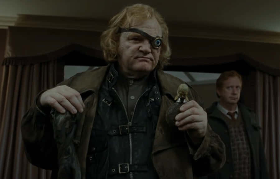 One Eyed Character Holding Figurine Wallpaper