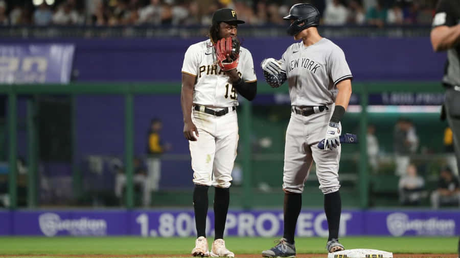 Oneil Cruzand Opponent Player Baseball Game Wallpaper