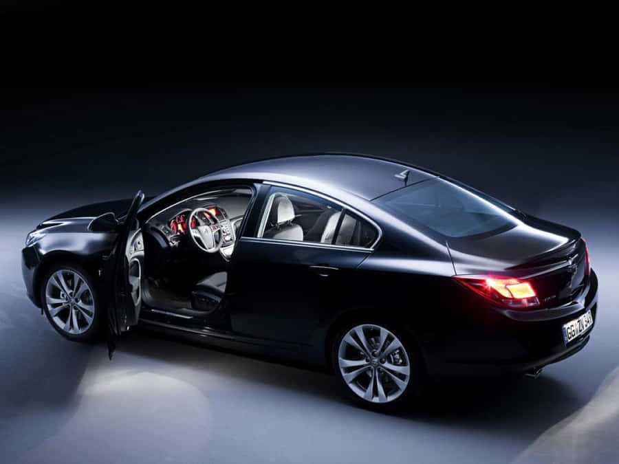 Opel Insignia Luxury Sedan On The Road Wallpaper