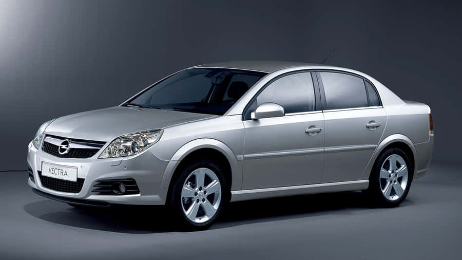 Opel Vectra Speeding On A Highway Wallpaper
