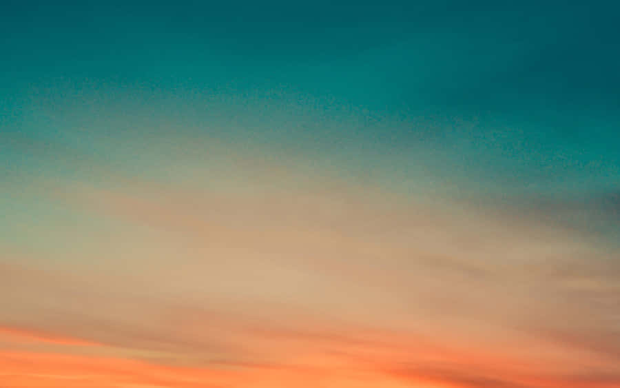 Orange And Teal Sunset Sky Wallpaper