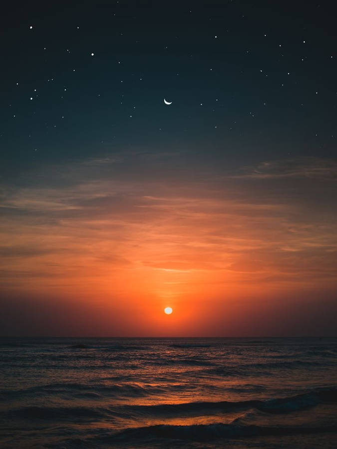 Orange Sun And Crescent Moon Wallpaper