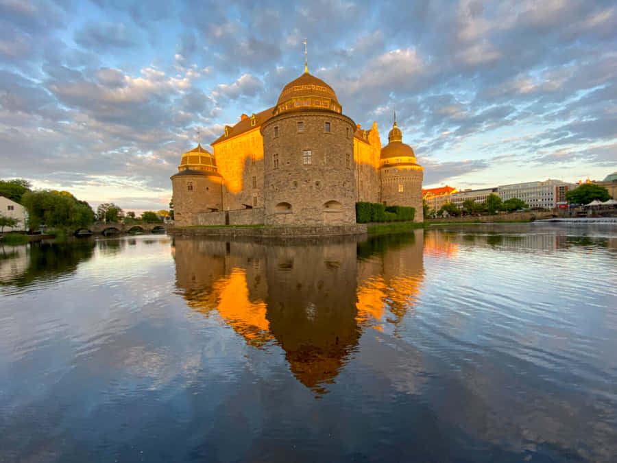 Orebro Castle Sunset Reflection Wallpaper