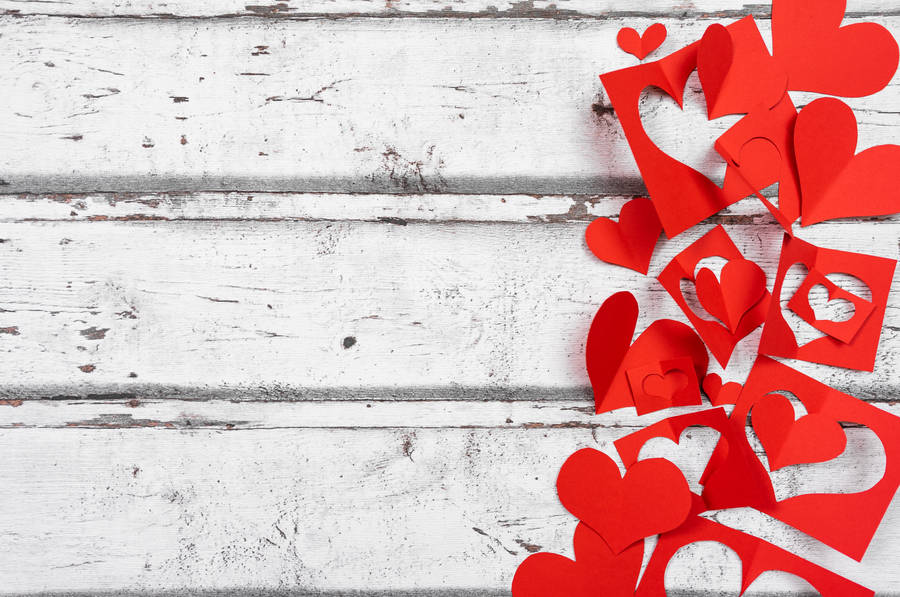 Paper Cutouts Of Aesthetic Heart Shapes Wallpaper