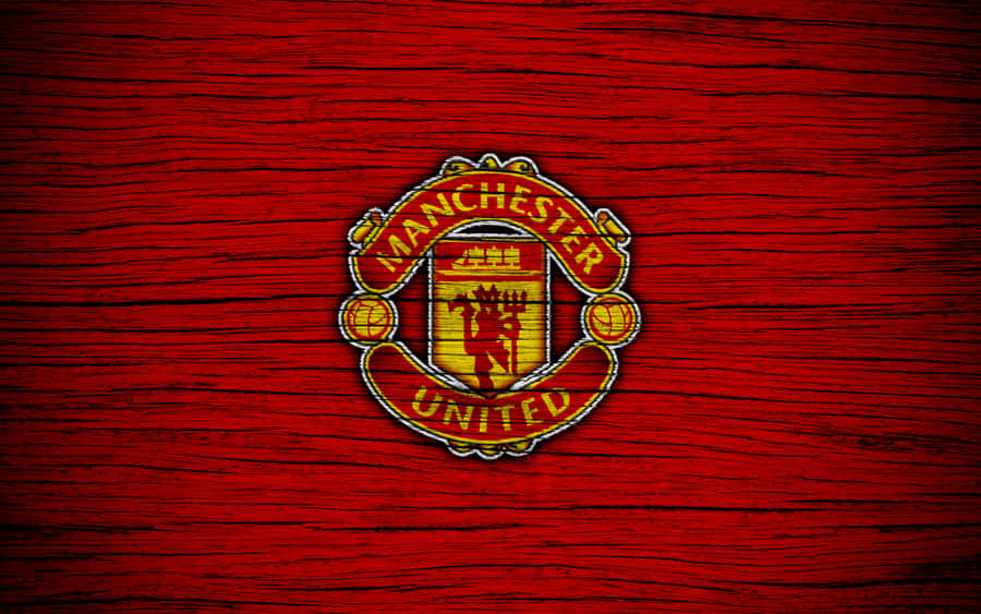 Passionate Manchester United Players Celebrating Victory Wallpaper