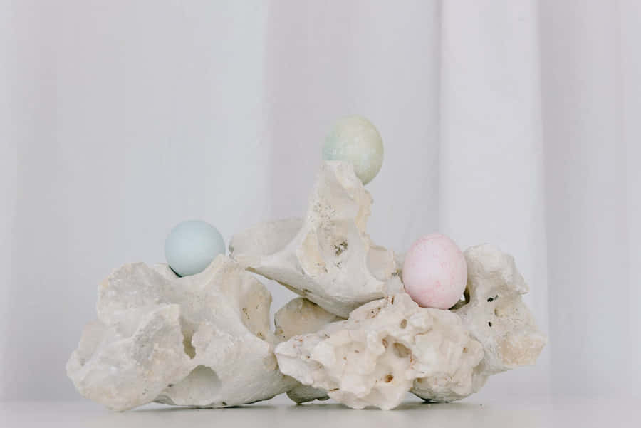 Pastel Easter Eggs On Rock Wallpaper