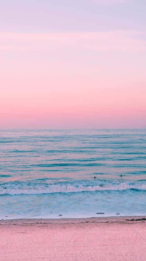 Pastel Sunset Beach Surfers.jpg Wallpaper
