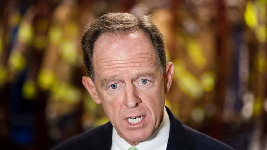 Pat Toomey Looking Down Wallpaper