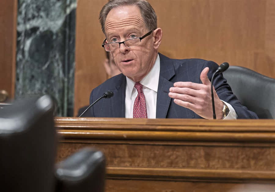 Pat Toomey Passionately Making A Point In A Committee Meeting Wallpaper