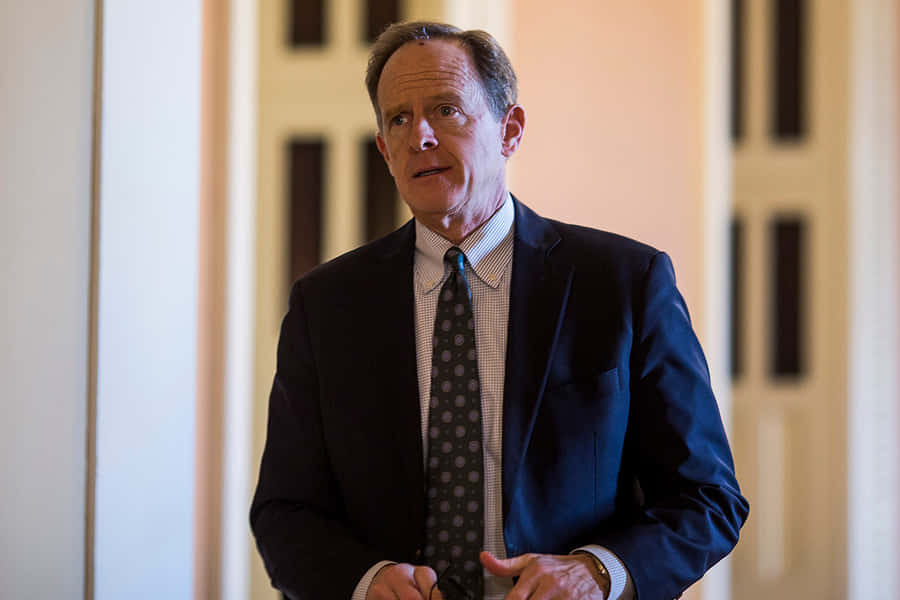 Pat Toomey With Hands On His Front Wallpaper
