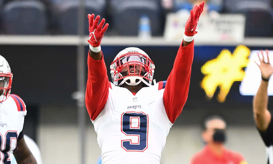 Patriots Player Celebrationon Field Wallpaper