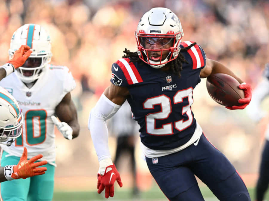 Patriots Player Running With Football Wallpaper