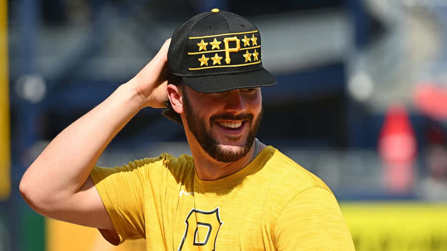 Paul Skenes Smiling In Pirates Cap Wallpaper