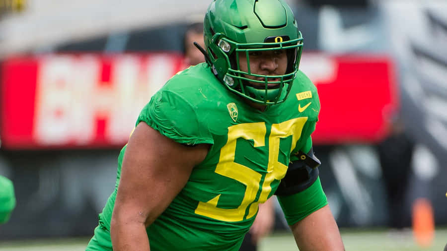 Penei Sewell Oregon Football Action Wallpaper