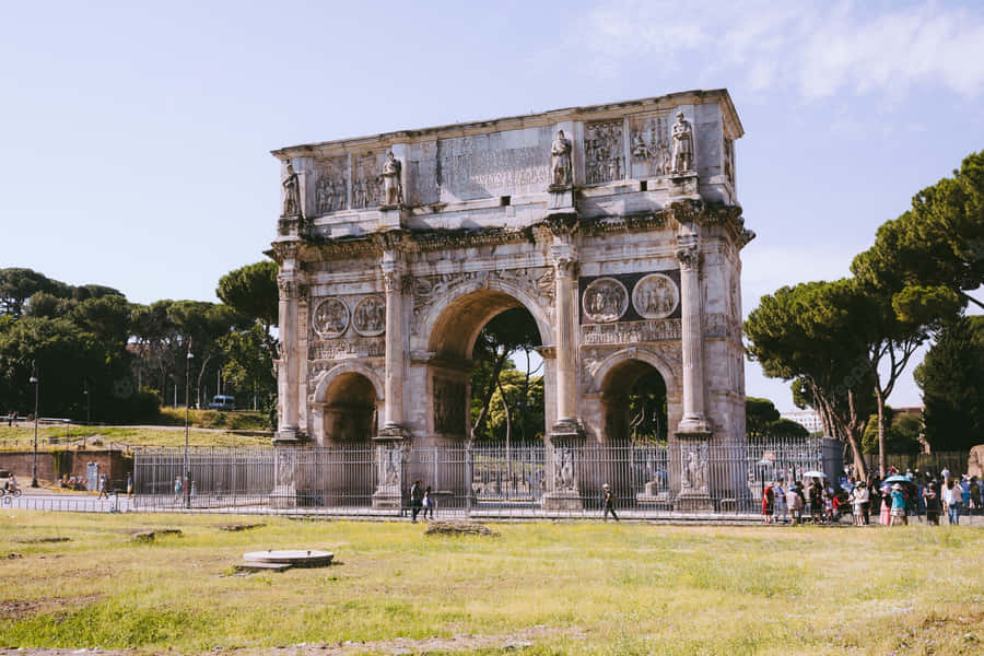 People Visiting Arch Of Constantine Wallpaper