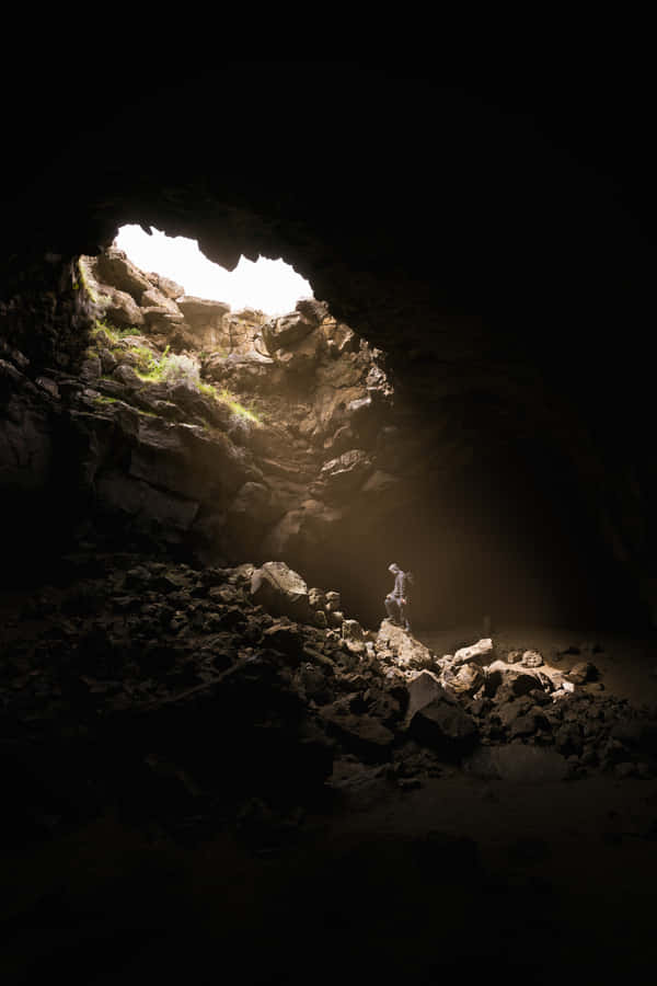 Person Stranded In A Cave Wallpaper